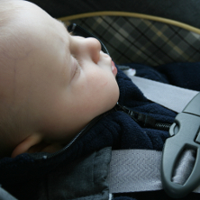 Baby strapped in car seat