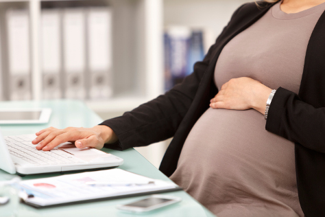 Pregnant woman at work